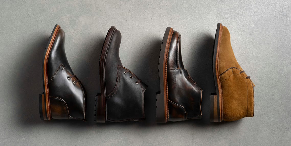 Four handcrafted boots in black, brown and suede